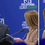 Meloni sul palco a Milano, un uomo si avvicina al microfono e gela tutti: “Aspetto le dimissioni di Mattarella”